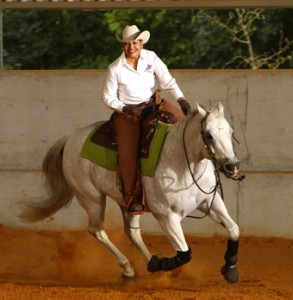 reining-my-way- Kiki-Maurey- Man-Riding-Horse-In-The-Arena 